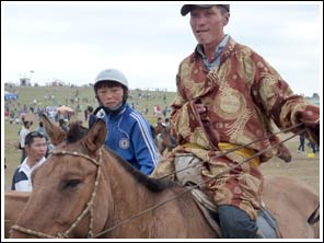 Jonge jockey en begeleider