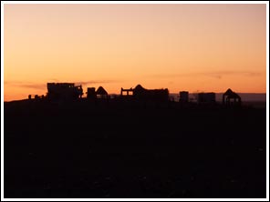 zonsondergang boven camping in Mhamid